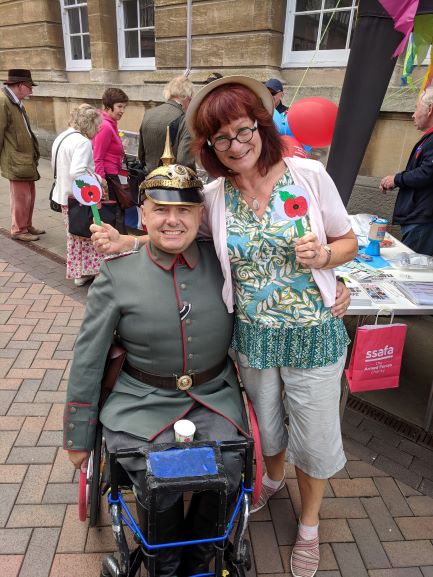 Picture Chris Auker-Howlett dressed as a German Officer and Janet Murden, event volunteer