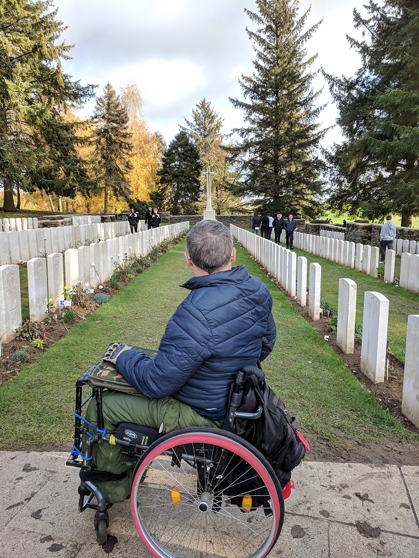 Image of Christopher Auker-Howlett taking in the sombre scene of Allied War Graves