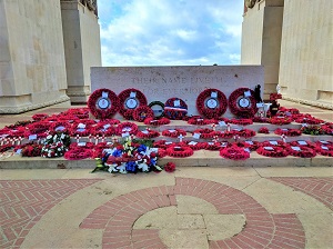 Photo of poppy wreathes and crosses inside Thiepval Memorial