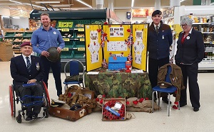 Photo of Christopher Auker-Howlett with Tesco Store Managers and Veteran Volunteer collecting for the Royal British Legion Poppy Appeal, 2019, at the Churchdown Tesco Store